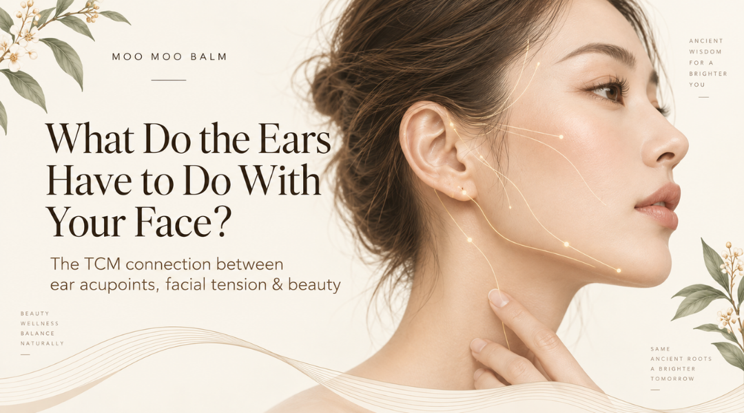 Woman showing the ear and jaw area illustrating the TCM connection between ears, facial tension, acupoints and beauty.