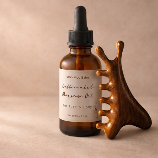 caffeinated massage oil with wooden gua sha tool for facial massage and depuffing