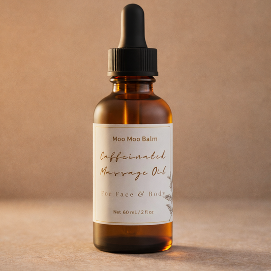 Bottle of Moo Moo Balm Caffeinated Massage Oil on a beige background