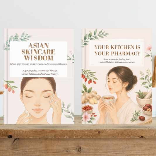 A bundle mockup featuring the “Asian Skincare Wisdom” and “Your Kitchen Is Your Pharmacy” digital guides standing side by side on a rustic wooden surface. The covers use soft neutral tones with botanical illustrations and feminine artwork, creating a calm, premium wellness aesthetic inspired by Asian skincare rituals, healing foods, and holistic beauty.