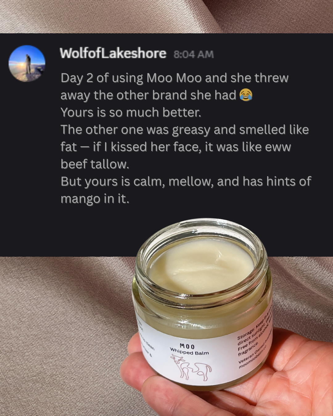 Hand holding open jar of Moo Moo Balm whipped tallow moisturizer, featured with customer review praising its smooth, mellow texture with mango butter and non-greasy feel.
